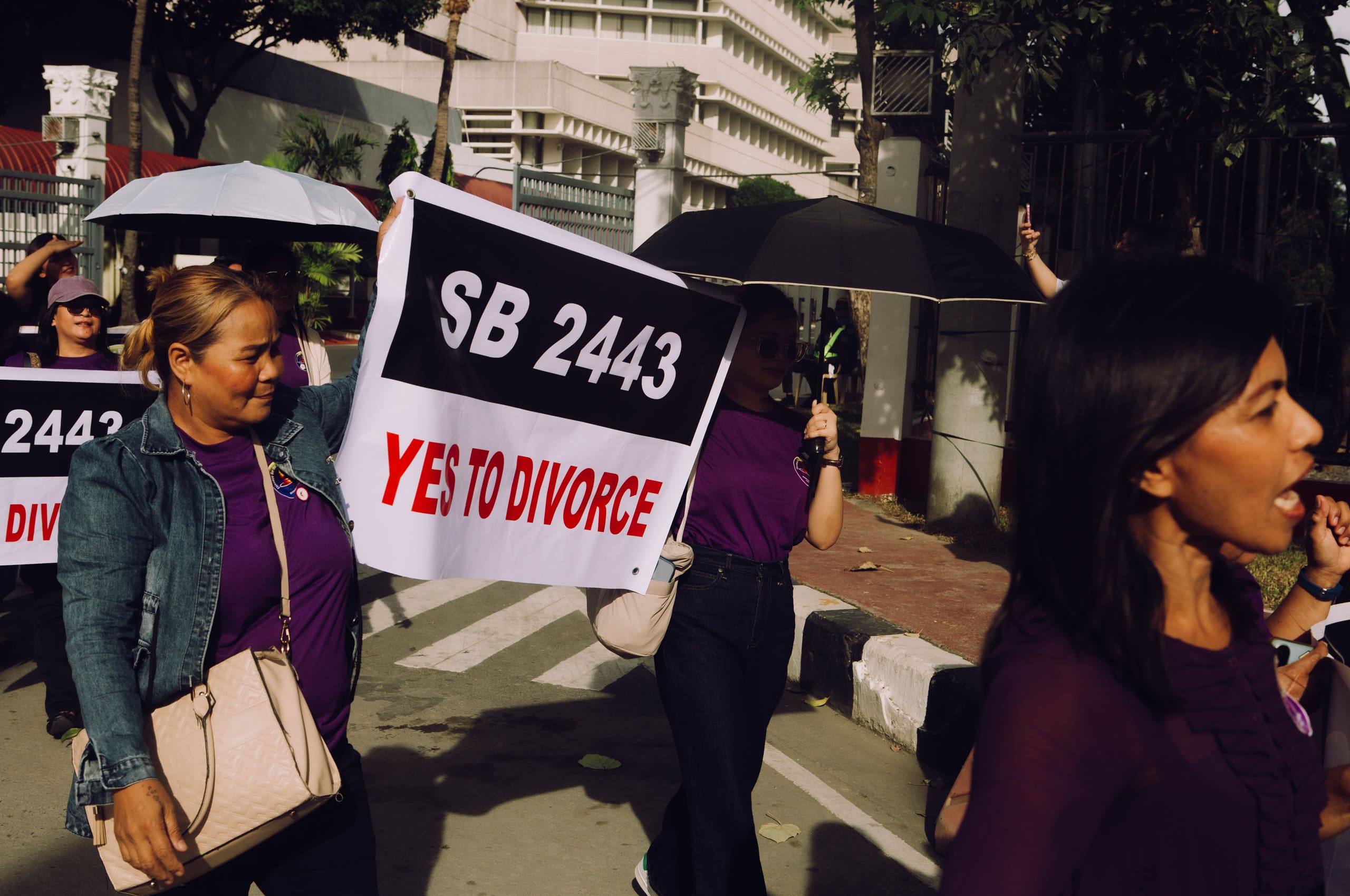 A pro-divorce advocacy group marching along Roxas Boulevard