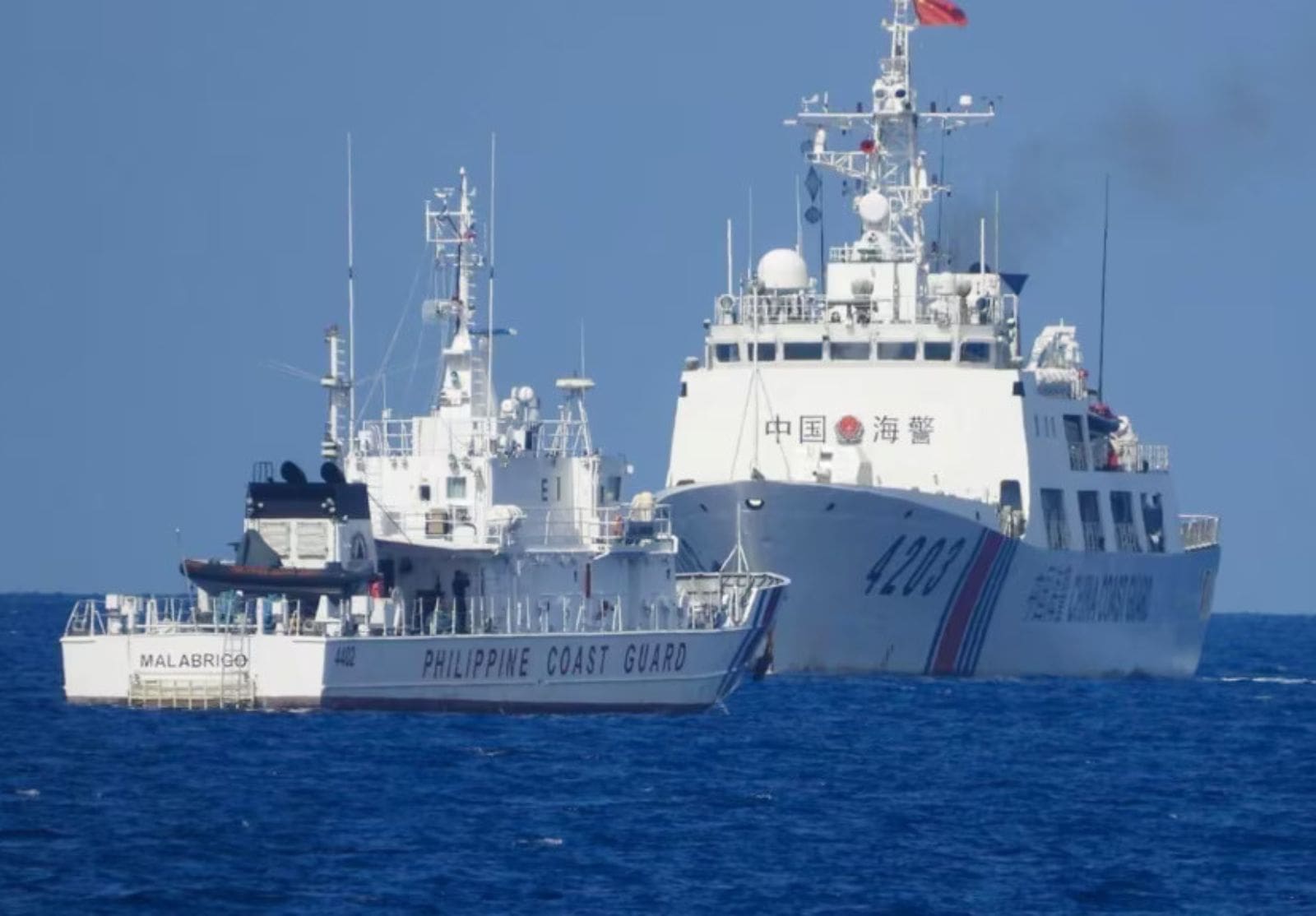 China coast guard vessel and Philippine coast guard vessel in standoff